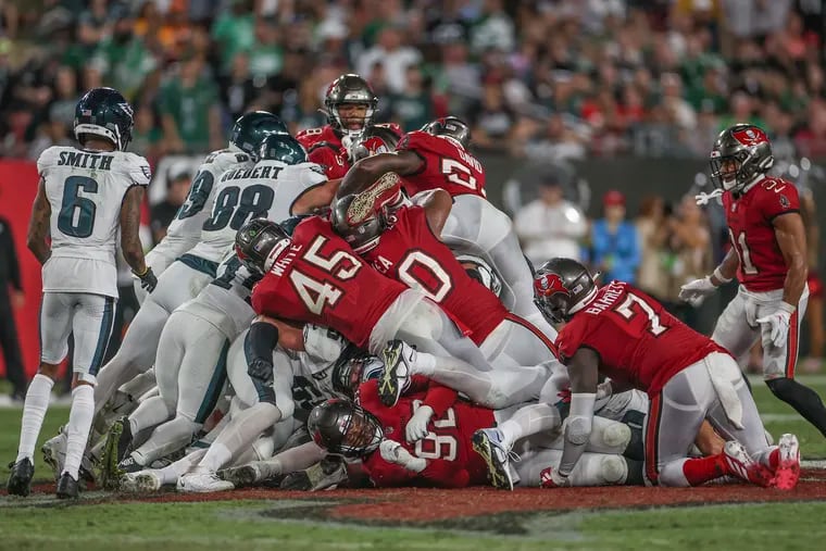 Tampa Bay Buccaneers defense tries to stop the Eagles’ "Brotherly Shove" to get a first down in the second half of a game in Tampa, Fla., on Monday, Sept. 25, 2023.