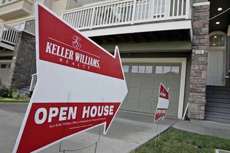 A development beckons would-be home buyers in East Palo Alto, Calif. In terms of sales-price declines, California had all of the 10 worst-performing markets in the country. (AP Photo)
