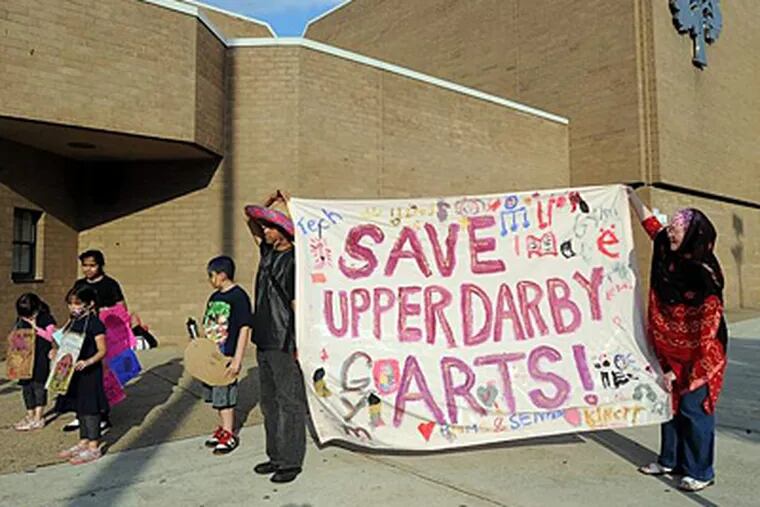 May 2012 file photo: Parents and others protest proposed cuts to arts and music programs outside Upper Darby High School before a recent school board meeting. SHARON GEKOSKI-KIMMEL / Staff Photographer