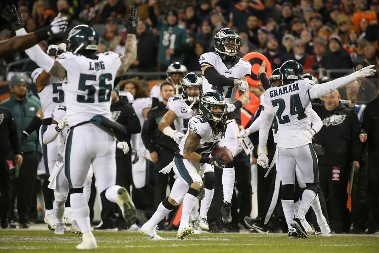 Eagles cornerback Avonte Maddox (29) and his teammates celebrate after they thought he made an interception, which was later ruled out of bounds and therefore only an incomplete pass after review, during a first-round playoff game against the Chicago Bears at Soldier Field in Chicago on Sunday, Jan. 6, 2019.