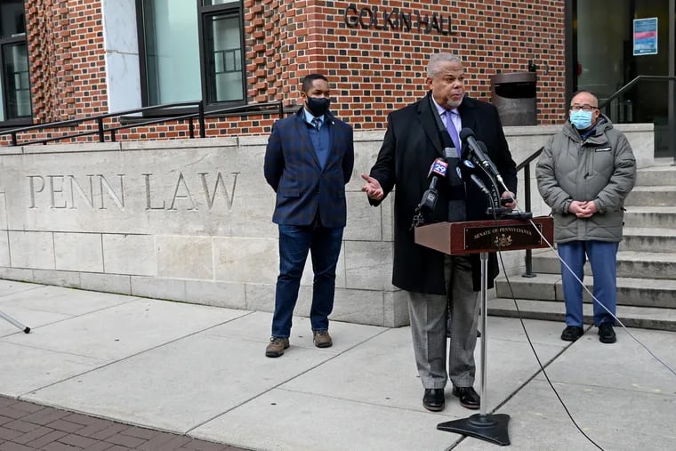 State Sen Anthony H. Williams (center) hosts a news conference outside the University of Pennsylvania Carey Law School Jan. 13, 2022. They discussed the “racist comments” made by tenured Penn Law professor Amy Wax, calling them “hateful and inaccurate rhetoric” and called for action against Wax by the school.