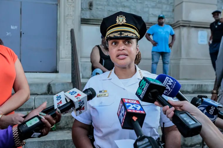 Police Commissioner Danielle Outlaw talks to the media after participating in an anti-violence prayer walk after the mass shooting in Kingsessing on Wednesday.