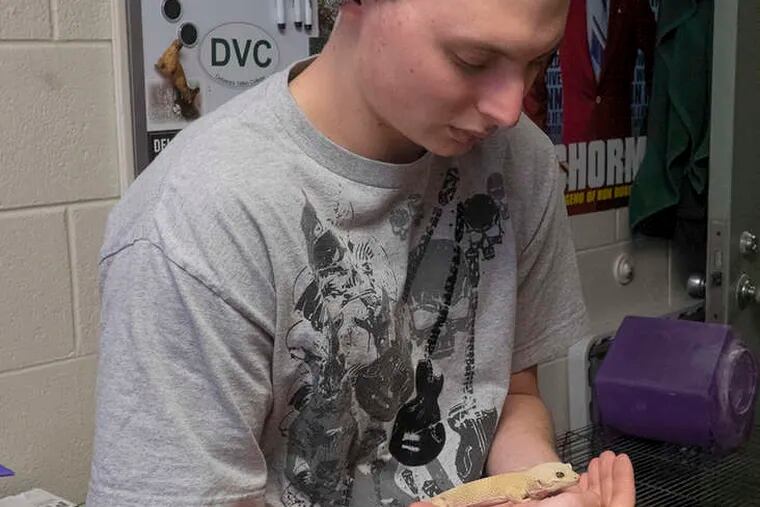 Nick Annese, 20, cradles his gecko, Randall, at Delaware Valley College, which might expand the program next year.