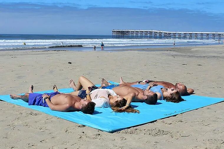 The Monster Towel is 10 feet by 10 feet, enough room for the whole gang to spread out on.