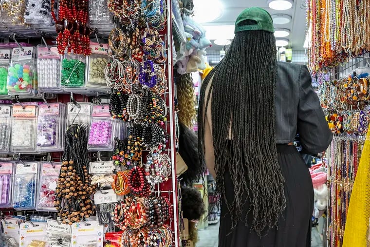 Sabreen Lateef, 26, shops in the 18th arrondissement of Paris on Oct. 2, 2023.