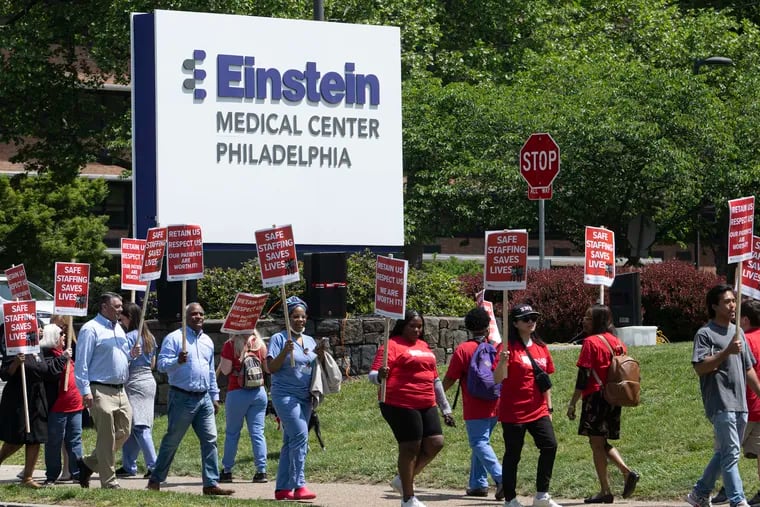 Einstein nurses, currently in contract negotiations, rally on Thursday outside Albert Einstein Medical Center in Philadelphia.