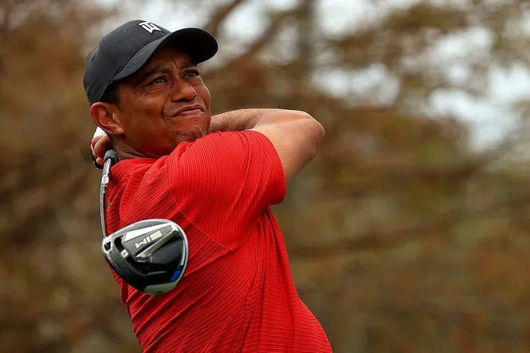 Tiger Woods, shown hitting a tee shot on the 15th hole during the final round of the PNC Championship at the Ritz Carlton Golf Club on Dec. 20, 2020 in Orlando.