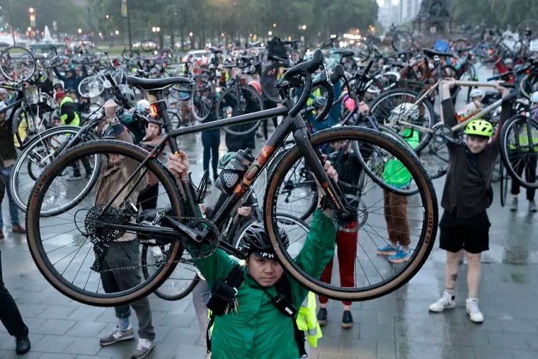 At the conclusion Wednesday night of the Ride of Silence — an annual event honoring Philadelphia-area cyclists killed or injured by motor vehicles — participants gathered at the Art Museum and raised their bikes in memory of their loved ones.