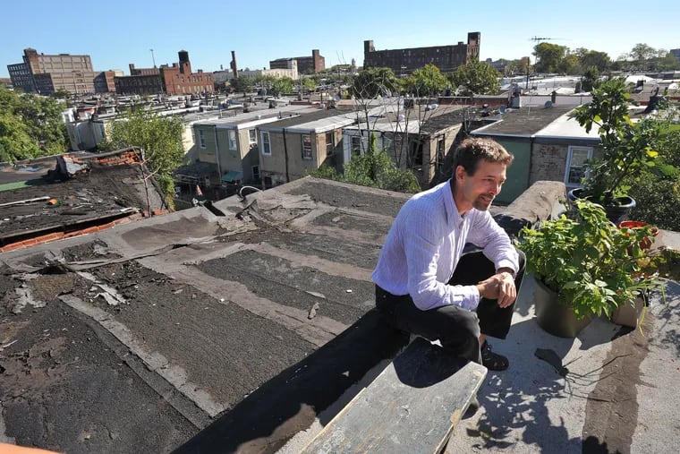 Philippe Bourgois, a former Penn professor who is now based at UCLA, in 2010 on the roof of the Kensington rowhouse he rented while he researched the neighborhood's drug markets. Bourgois is one of the authors of a new study on the prevalence of xylazine -- a powerful animal tranquilizer -- in Philadelphia's drugs supply.  (Sharon Gekoski-Kimmel / Staff Photographer)