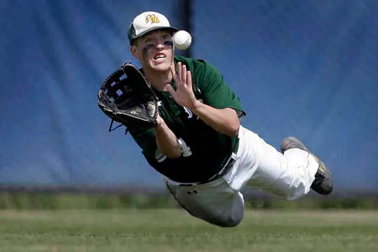 Monsignor Bonner's Rick Reigner makes a diving catch in the District 12 Class AAAA championship game against Central at La Salle High. Reigner contributed a run-scoring triple during a five-run fifth inning for the Friars (20-4).