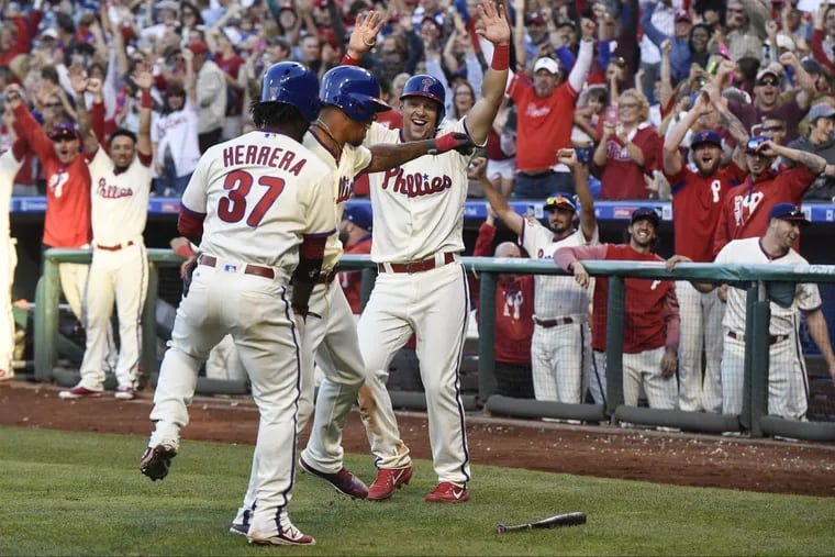 The Phillies and their fans go wild after Nick Williams (center) hit a three-run, inside-the-park homer against the Mets at Citizens Bank Park Oct. 1, 2017.  New Phillies manager Gabe Kapler says the team has the pieces to be a factor in the NL East in 2018.
