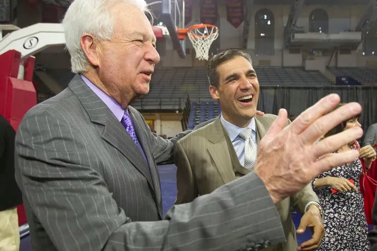 Big 5 Hall of Fame inductee Bill Raftery, left, a La Salle graduate and broadcaster, jokes with Villanova Head Coach Jay Wright before the Big 5 Hall of Fame ceremony on April 13, 2015.  (CHARLES FOX / Staff Photographer)