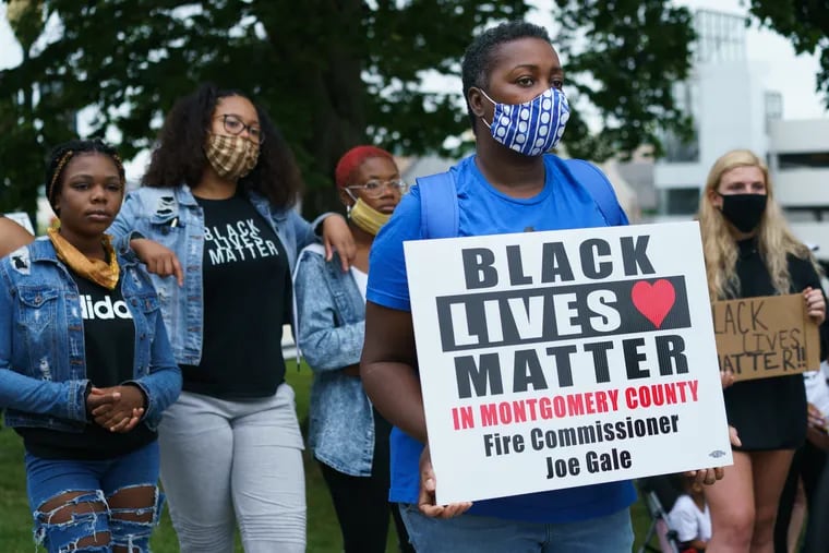 Tomika Bryant at a rally calling for the resignation of Montgomery County Commissioner Joe Gale in Norristown on Thursday after Gale called the Black Lives Matter movement a "hate group."
