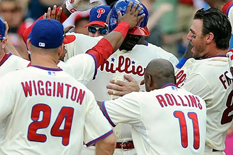The Phillies' weekend wins offer hope for the beleaguered team's future. (Michael Perez/AP Photo)