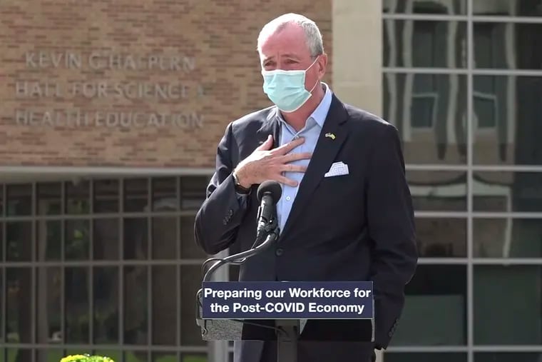 In this photo taken from video provided by the New Jersey Governor's Office, Gov. Phil Murphy informs listeners in Blackwood on Wednesday that he's about to go into quarantine.