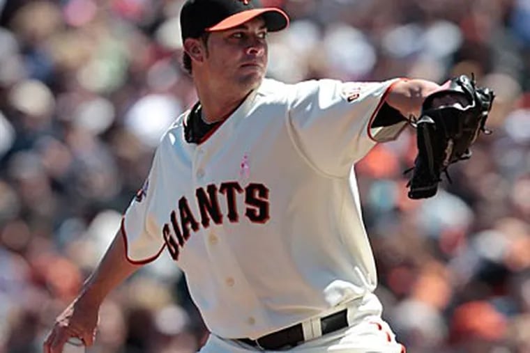 Former Phillies' minor leaguer Ryan Vogelsong has turned around his career with the San Francisco Giants this season. (Jeff Chiu/AP)
