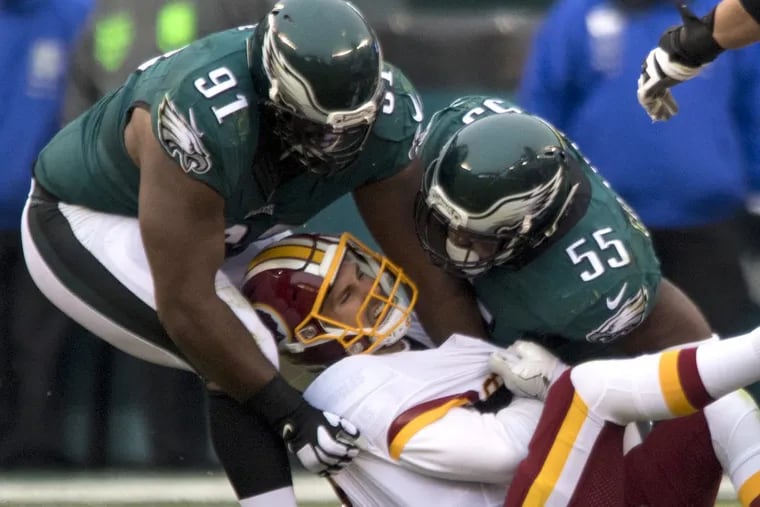 Vegas Vic thinks the Eagles defense, shown here draped all over Washington’s Kirk Cousins, is going to make life miserable for Arizona’s Carson Palmer. CLEM MURRAY / Staff Photographer