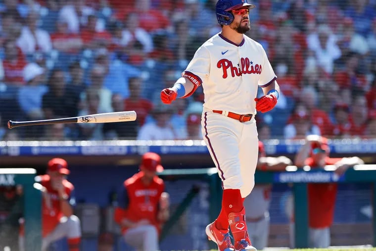 The Phillies' Kyle Schwarber tosses his bat after drawing a walk against the Los Angeles Angels on  June 5.