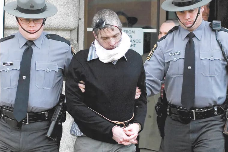 Serial killer Charles Cullen is led from the Lehigh County Courthouse in Allentown in March 2006 after receiving six life sentences for murders he committed in Pennsylvania.