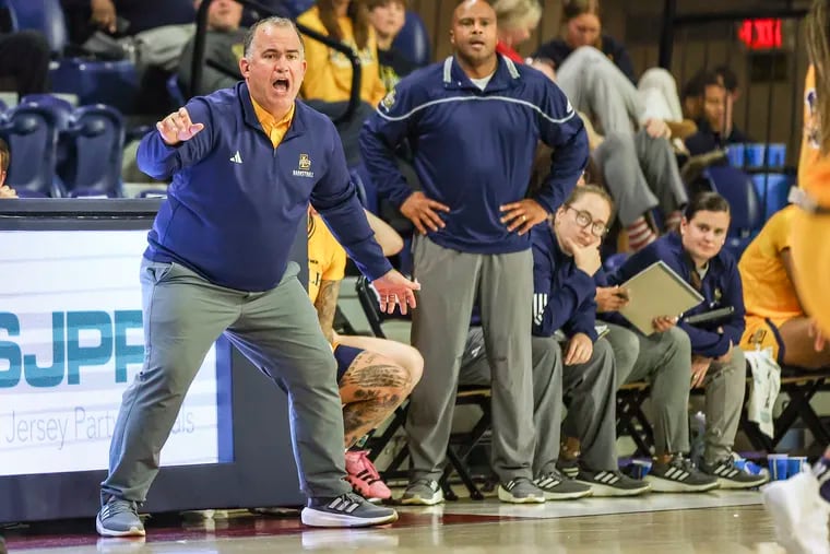 La Salle women's basketball coach Mountain MacGillivray (left) and the Explorers found their season come to an end following an opening-round loss to UMass in the Atlantic 10 Tournament.