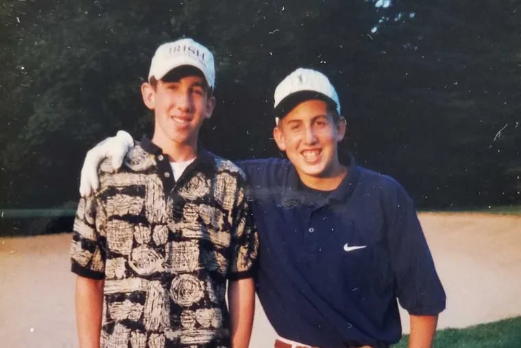 Sean Carney (left) and his brother Jim, in his second summer of caddying, 1996.
