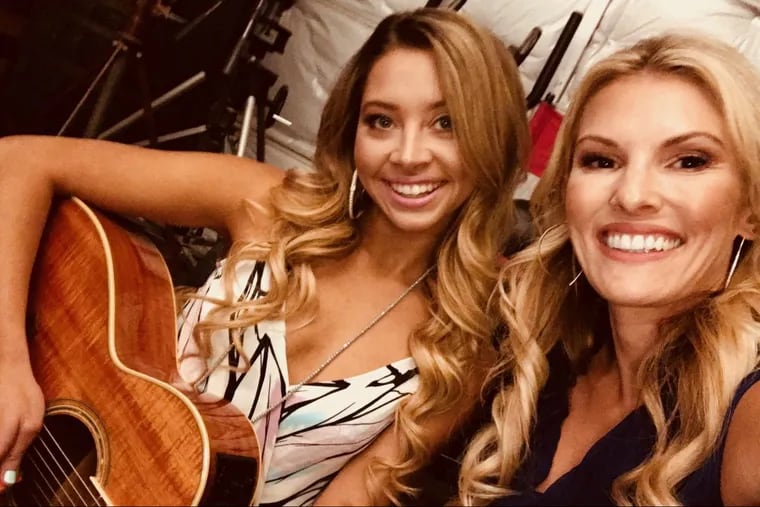Heidi Hamels (right) and singer Sara Spicer have teamed up as a songwriting pair, working on country songs.