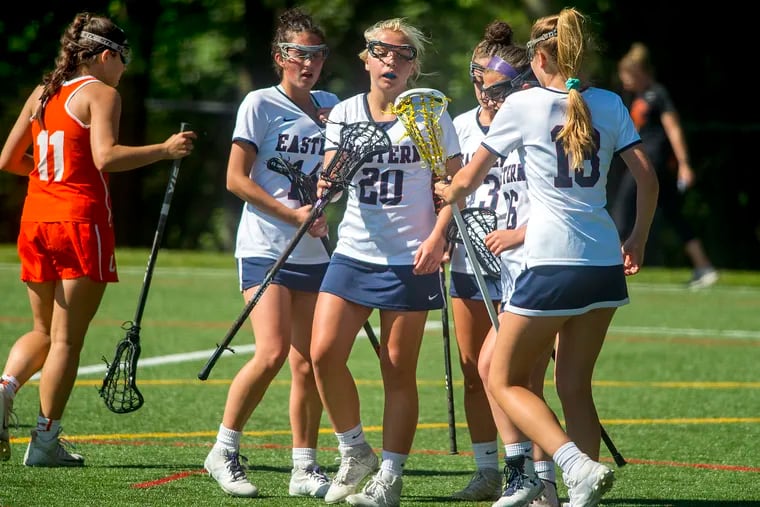 Eastern's Ryleigh Heck (#20) is congratulated by teammates after scoring her third goal in the first half of their semi final game in the NJSIAA South Jersey Group 4 girls lacrosse state tournament at home against Cherokee May 21, 2019. Heck made all three of her first half shots on goal.