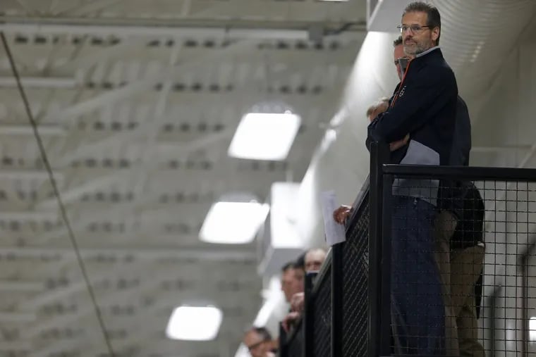 Ron Hextall watches development camp at the Flyers Skate Zone in July.