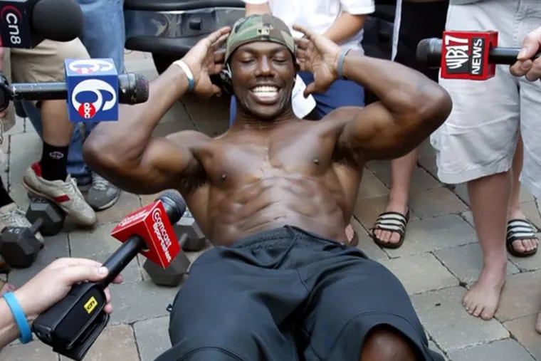 You want drama? T.O. knows drama. Here is the mercurial star doing sit-ups at his home in Moorestown home after he was banished from training camp in 2005.