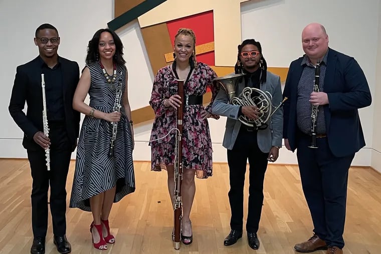 Imani Winds - including new hornist Kevin Newton - at its first in-person performance since the pandemic shutdown, in March at the Phillips Collection in Washington, D.C. The other members are flutist Brandon Patrick George, oboist Toyin Spellman-Diaz, bassoonist Monica Ellis and clarinetist Mark Dover.