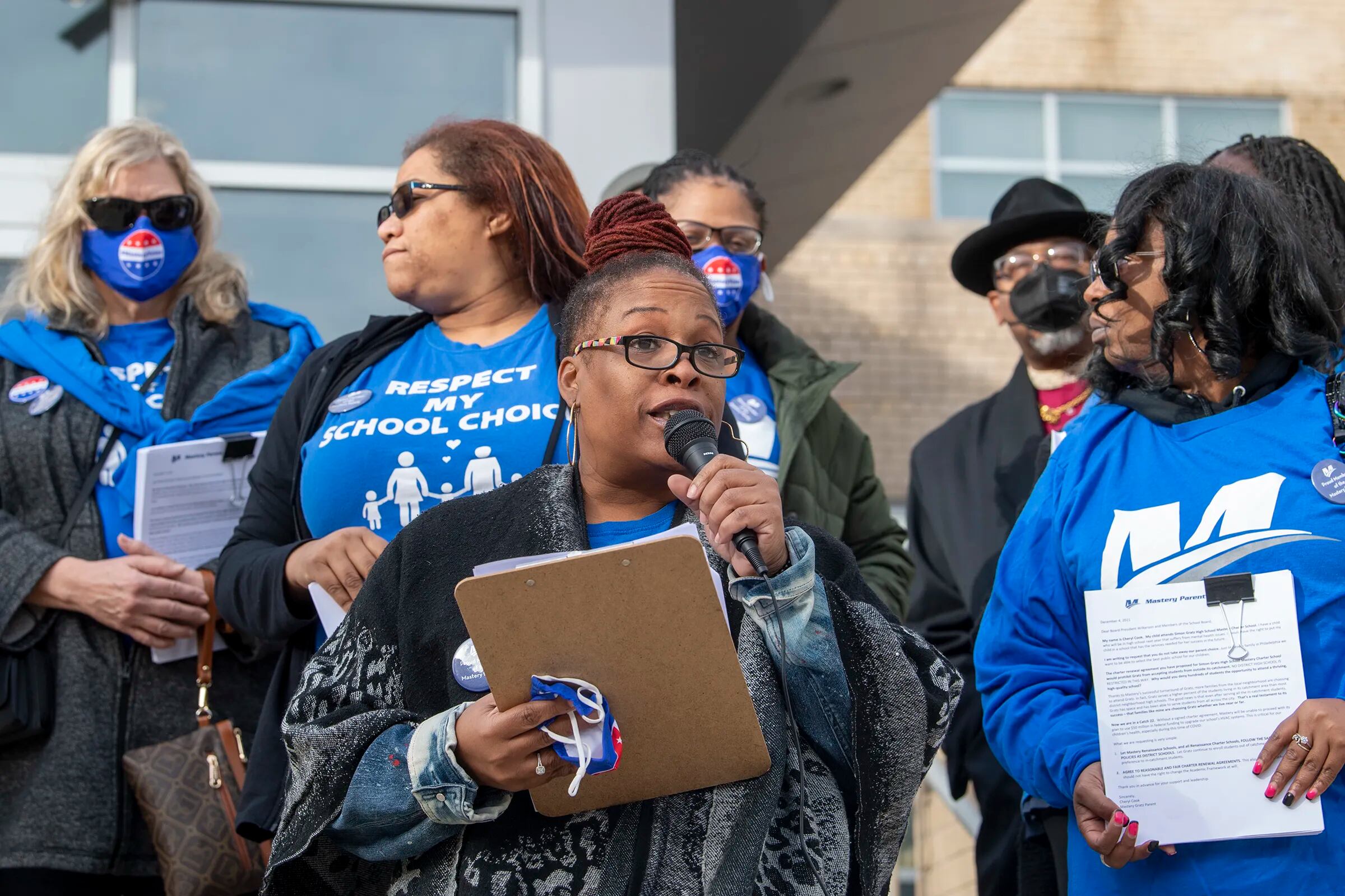 Markida Ross, a Mastery Gratz parent and Mastery board member, speaks outside at a rally to call attention to changes in the Philadelphia School District's admission policy that Ross and other Mastery parents say hurts their children.  