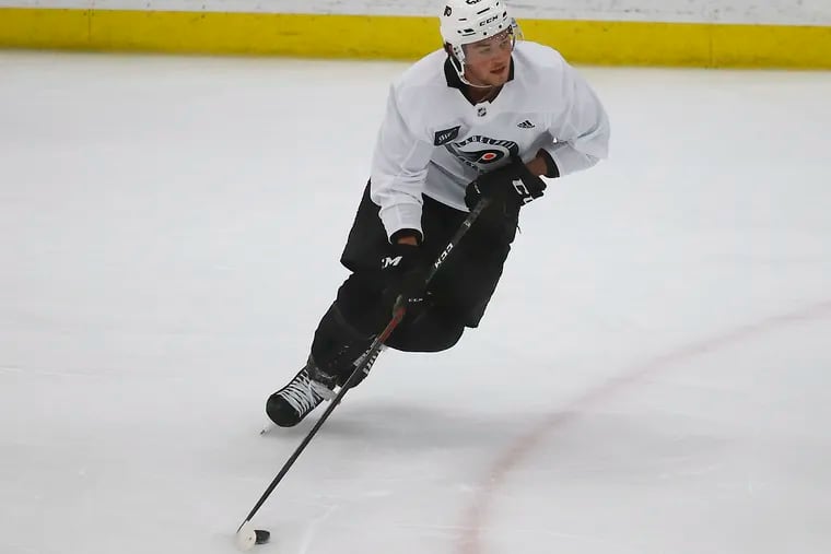 Flyers forward Tyson Foerster skates with the puck during team development camp drills at the Flyers Skate Zone in Voorhees, New Jersey on Sunday, August 29, 2021.
