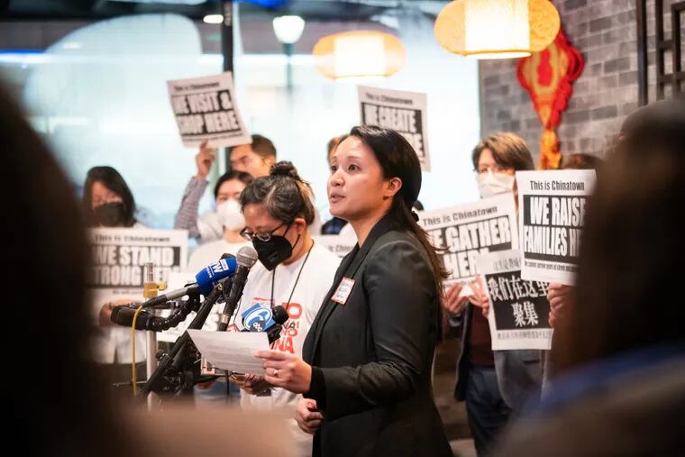 Elizabeth Koo speaks at a news conference announcing a formalized coalition opposing the Sixers arena Monday at Tom's Dim Sum in Philadelphia.