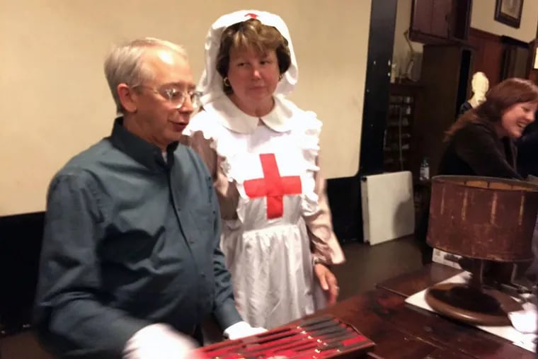 Thomas Jefferson University Hospital employees Michael Angelo, archivist, and Beth Ann Swan, dean of College of Nursing, take part in “Science Expo 1866” at Wagner institute.