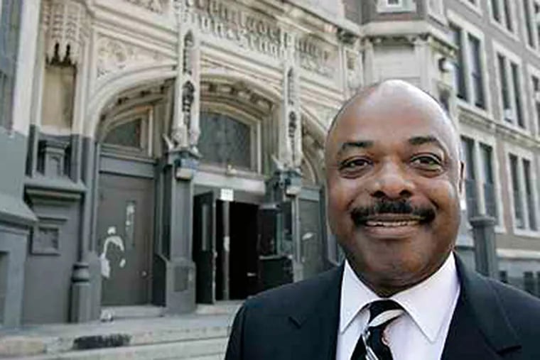 Jerry Jordan, president, Philadelphia Federation of Teachers, poses for photo in front of West Philly High School. (Akira Suwa / Inquirer