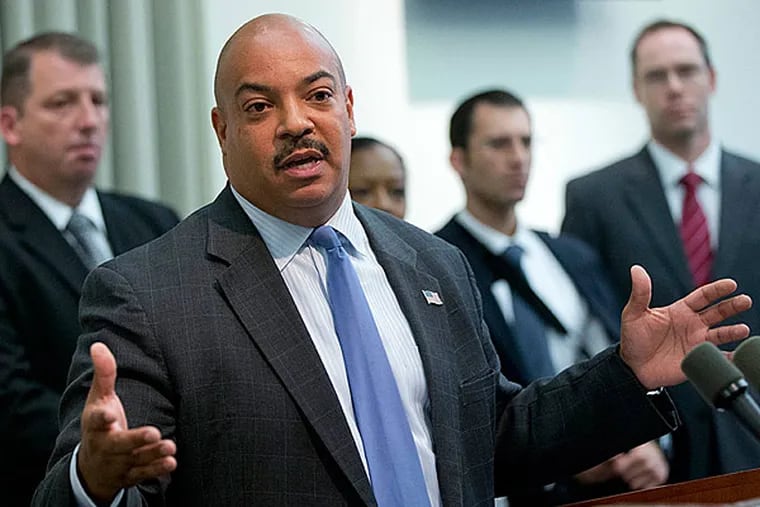 Philadelphia District Attorney Seth Williams speaks during a news conference Wednesday in Philadelphia, announcing that a grand just is investigating accusations that four state lawmakers accepted cash from an informant in exchange for political favors.