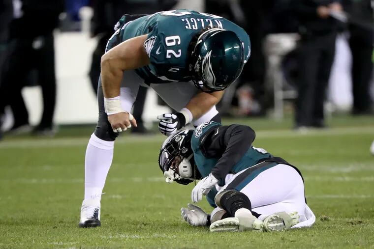 Eagles running back Mile Sanders got injured on this play this time last year. It would be dumb to expose him to injury again. Eagles center Jason Kelce left looks on.