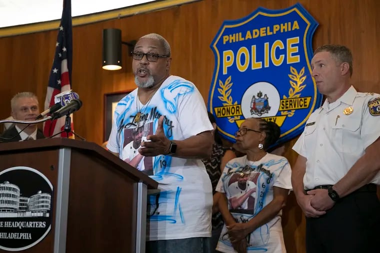 Richard Brown, father of Andrew Moss-Brown, 27, who was fatally shot June 21, 2019, in North Philadelphia, speaks about the new PhillyUnsolvedMurders.com website, during a news conference Thursday, Aug. 22, 2019. At right is Deputy Police Commissioner Dennis Wilson. At left is Homicide Capt. Jason Smith.