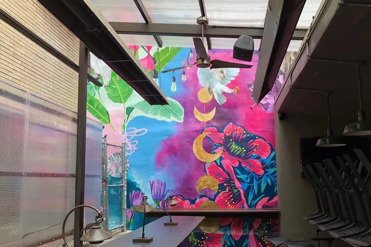 Mural unveiled April 19, 2018, by artist Ali Williams at Graffiti Bar.