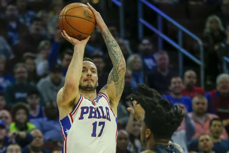 J.J. Redick made 8 of 12 shots from three-point range against the Magic.