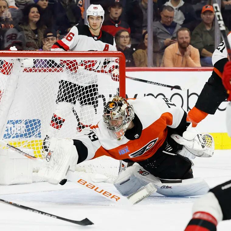 Flyers goaltender Carter Hart stops New Jersey Devils right wing Alexander Holtz’s second period power play shot attempt.