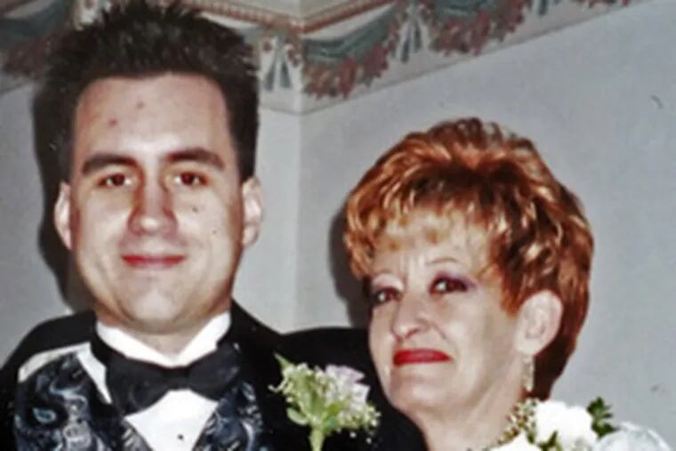 Sean Patrick Conroy, with his mother, Sharon Conroy. The 36-year-old Starbucks manager died of an asthma attack brought on by blunt force trauma, authorities said.
