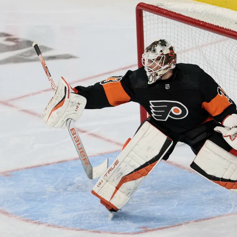 Flyers goalie Samuel Ersson, blocking a shot by the Ducks in January, is battling for the backup goalie job in training camp.