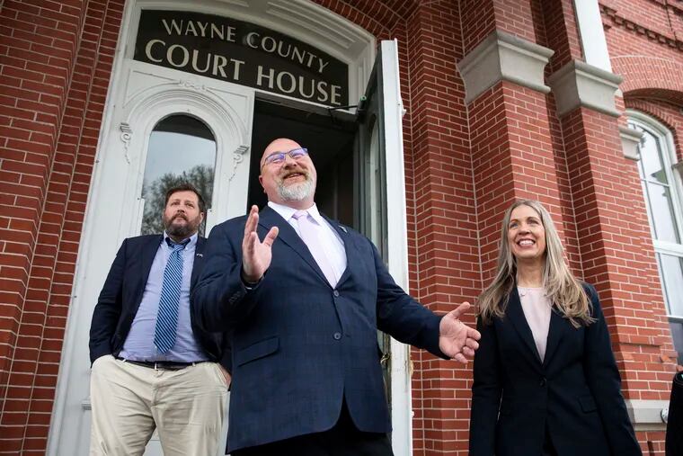 Republican candidate for Pennsylvania lieutenant governor Teddy Daniels reacts outside the Wayne County Court House in Honesdale. Daniels appeared in court on accusations made by his wife that he had been persistently verbally abusive, stalking her at work and keeping her away from family.