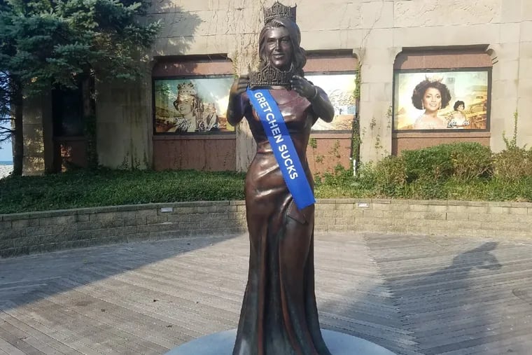 A "Gretchen Sucks" sash was placed on the Miss America statue Thursday morning in Atlantic City