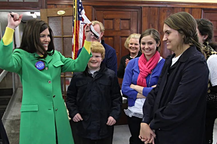 Democratic candidate Kathleen Kane celebrates with friends, family, and supporters after she voted. She will face Republican District Attorney David Freed of Cumberland County in November. MICHAEL J. MULLEN / Scranton Times-Tribune
