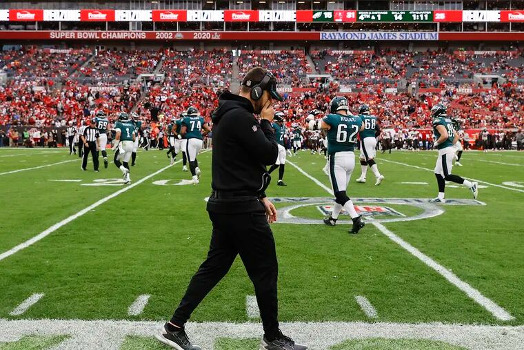 Eagles coach Nick Sirianni walks the sideline late in the fourth quarter against the Tampa Bay Buccaneers.