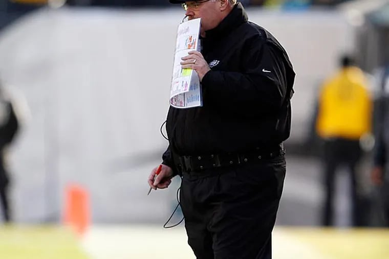 Eagles head coach Andy Reid stands on the sidelines. (Yong Kim/Staff Photographer)
