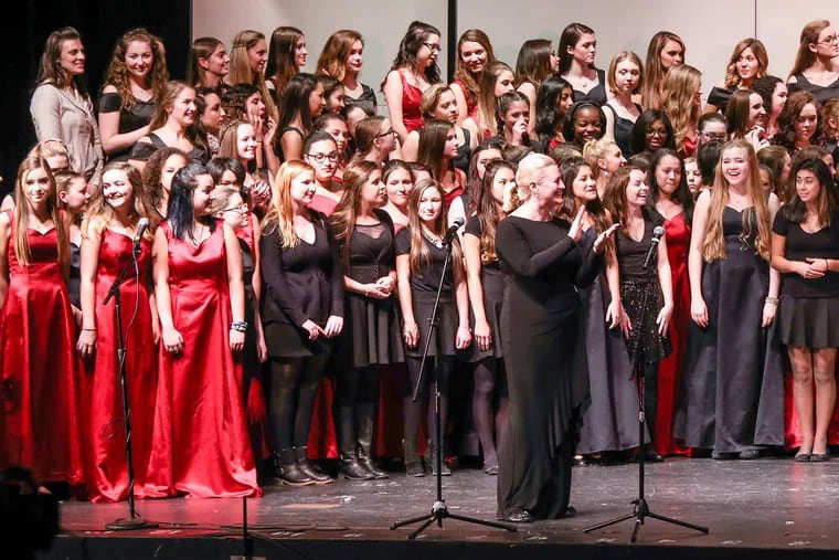 Cherokee High School's Concert Choir director Nicole Snodgrass and the choir at the school's holiday concert. In 2013, the Concert Choir also was chosen from choirs around the country to perform during the White House's annual winter holiday season open-house tours.