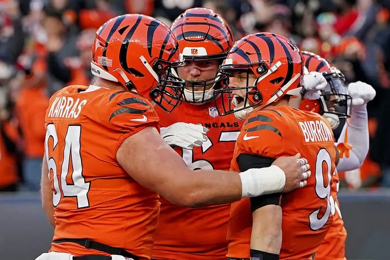 On New Year's Day, sports fans in Ohio will be able to legally wager on all of the state's professional and collegiate teams, including quarterback Joe Burrow (right) and the Cincinnati Bengals. (Photo by Dylan Buell/Getty Images)